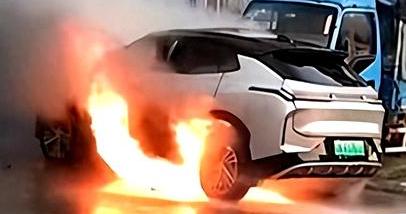 Electric vehicle catching fire while parked